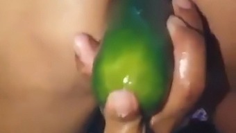 Stepmom Flaunts Her Big Ass While Pleasuring Herself With A Large Cucumber